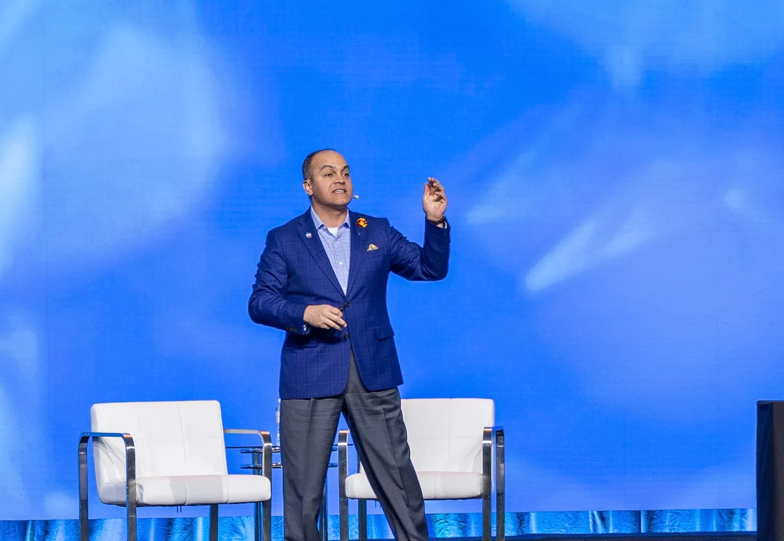 David Nour delivering a keynote on stage