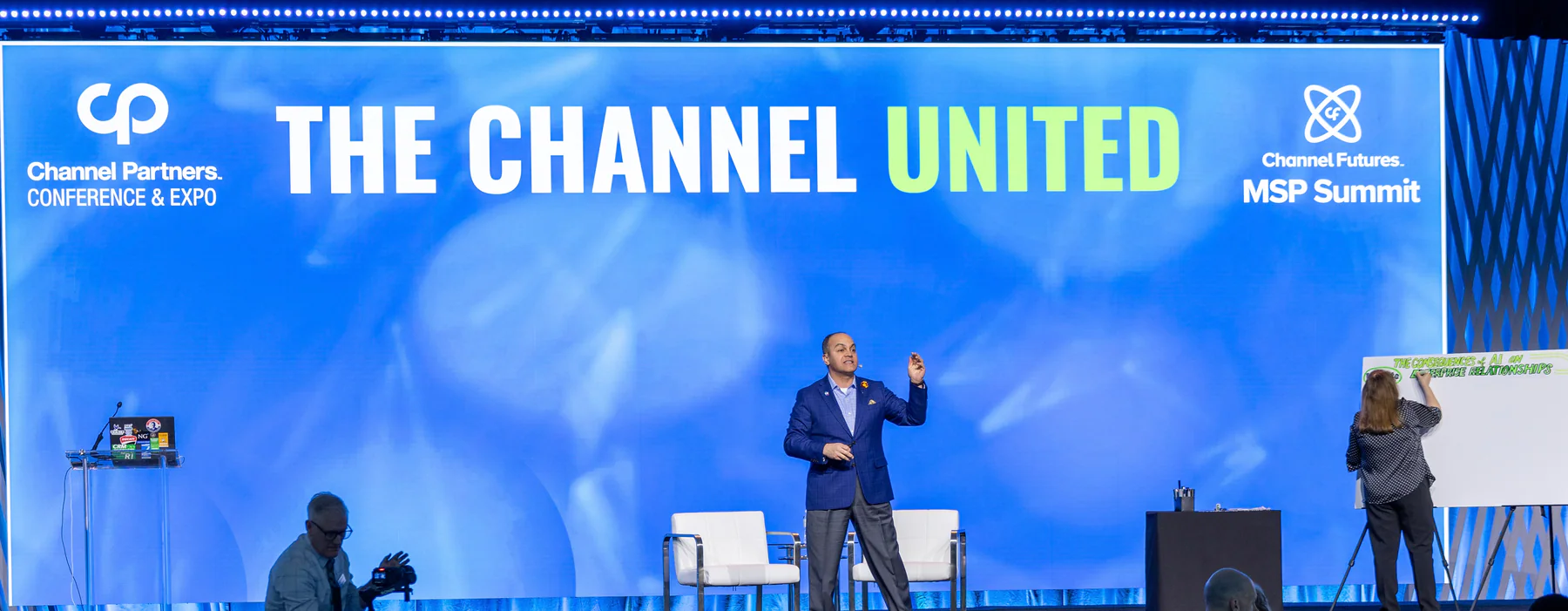 David Nour delivering a keynote on stage
