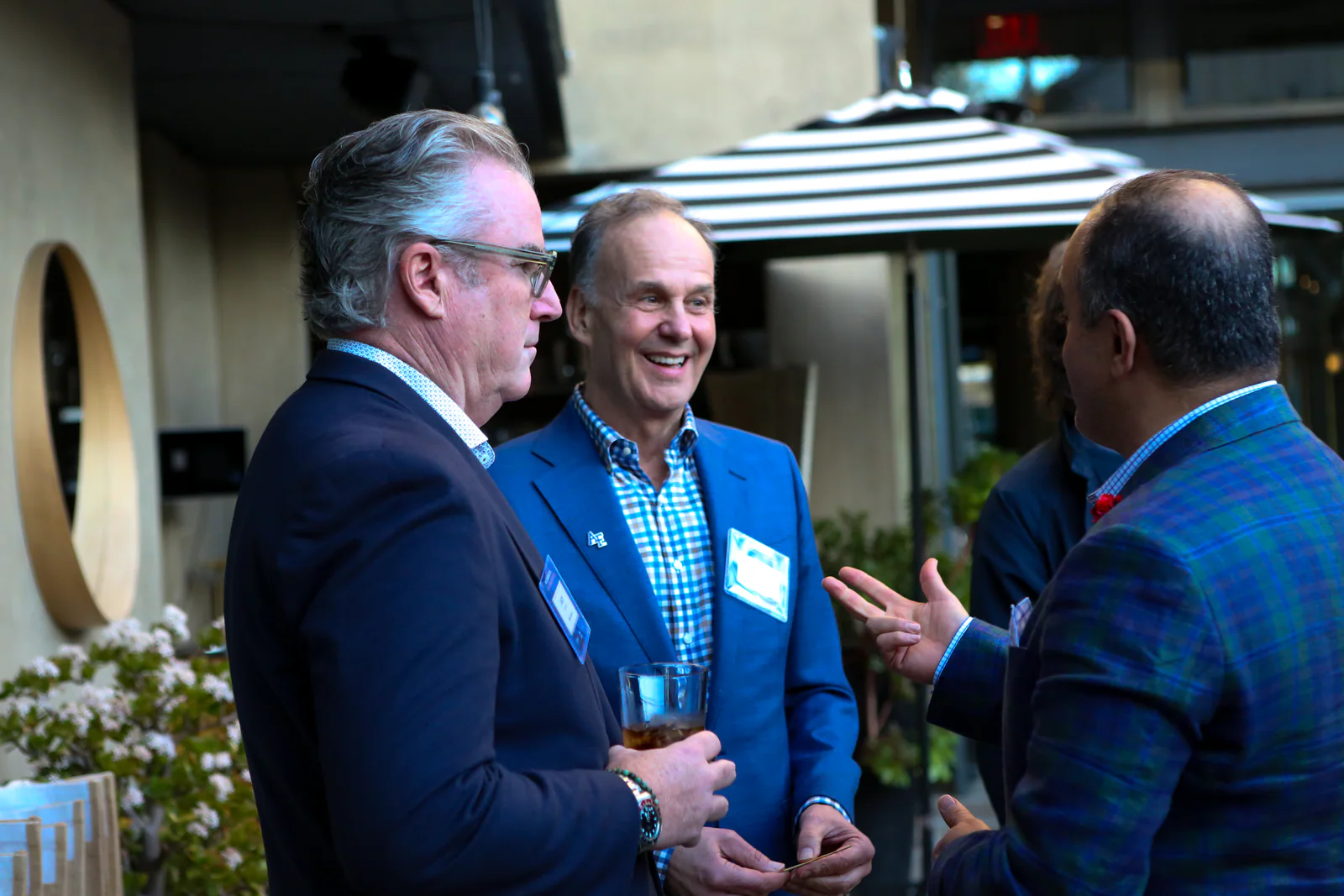 David Nour listening during an executive panel conversation