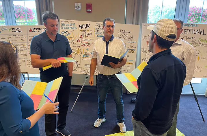 Leaders participating in an interactive learning session with David Nour